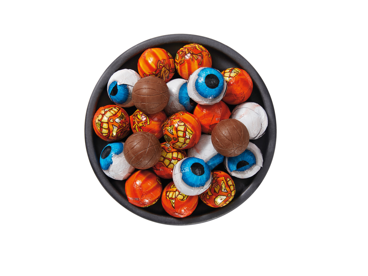 A bowl of Halloween-themed chocolates, including foil-wrapped eyeballs and pumpkin designs.