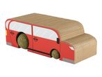Red and brown cardboard toy bus with two green textured balls as wheels.