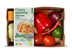 Vega curry madras maaltijdbox met rijst, groenten en vegetarische kipstukjes.