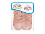 Pack of Krakow style smoked pork sausage slices with a folk art design on the label.