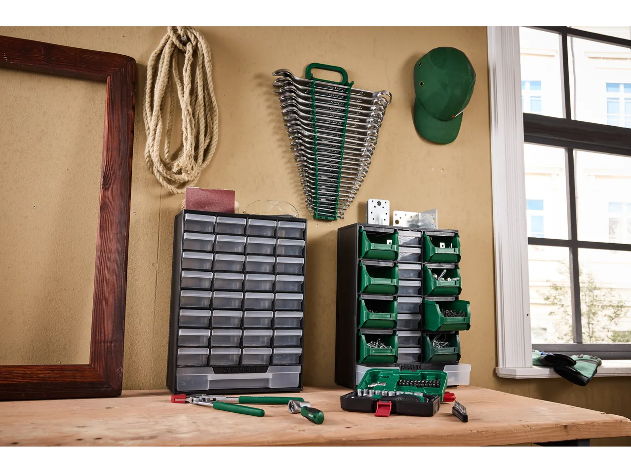 Parkside® Small Parts Organisers on a workbench with tools and a window.