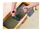 Right-angle drill attachment being used to screw a handle onto a wooden drawer.