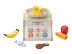 Toy grocery scale with a block of cheese, banana, fish, chicken leg, tomato, and carrot.