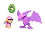 Toy dog figure in pink outfit, purple pterodactyl toy, and a green mystery dino egg.