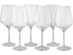Six clear wine glasses arranged in two rows.