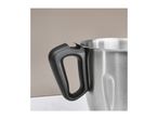 Close-up of a stainless steel blender pitcher with a black handle.
