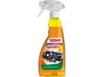 Orange spray bottle for car interior cleaning, with a label showing a car dashboard.
