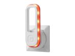 Plug-in LED night light with warm orange glow
