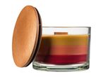 A multi-layered candle in a glass jar with a wooden lid