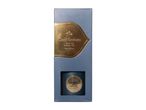 Dark Embers reed diffuser in elegant blue and gold packaging