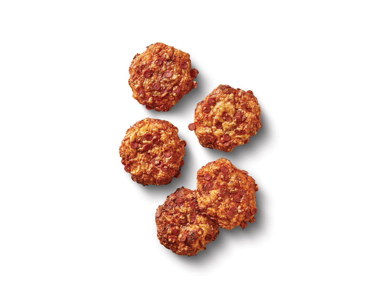 Fem minipizzor med pepperoni.