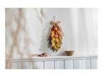 Autumnal door swag with pumpkins and leaves, dried flowers, and a wooden bowl on a shelf.