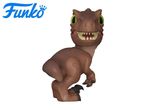 Brown dinosaur toy with green eyes and an open mouth showing teeth