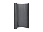 Grey privacy screen made of vertical slats, partially rolled up