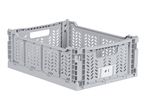 Light grey collapsible storage crate with a label showing '#1'.