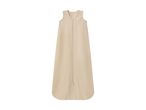 Beige baby sleeping bag with a zipper down the front.