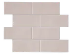 LIVARNO home self-adhesive wall tiles in a light beige color, arranged in a brick pattern.
