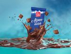 Fin Carré Alpenmilch csokoládé, csokidarabokkal és fröccsenő csokoládéval.