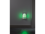 LIVARNO home LED Night Light emitting green glow in a dark room.