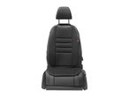 Front view of a black car seat with a headrest and textured fabric details.