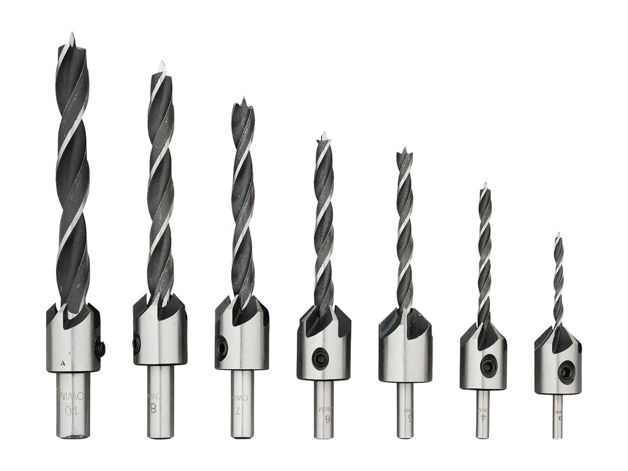 A set of eight Forstner drill bits of varying sizes.