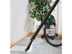 Parkside® 1600W Carpet Cleaner in use, cleaning a grey carpet.