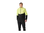 Man in a black and yellow athletic jacket and black athletic pants