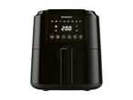 A black Breville air fryer with a digital display.