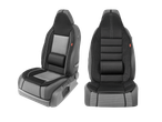 Dva avtomobilska sedeža v črni in sivi barvi, spredaj in zadaj.