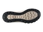 Sole of a shoe with a black and beige tread pattern