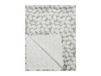 Grey tablecloth with a white seashell pattern, folded to show the reverse side.