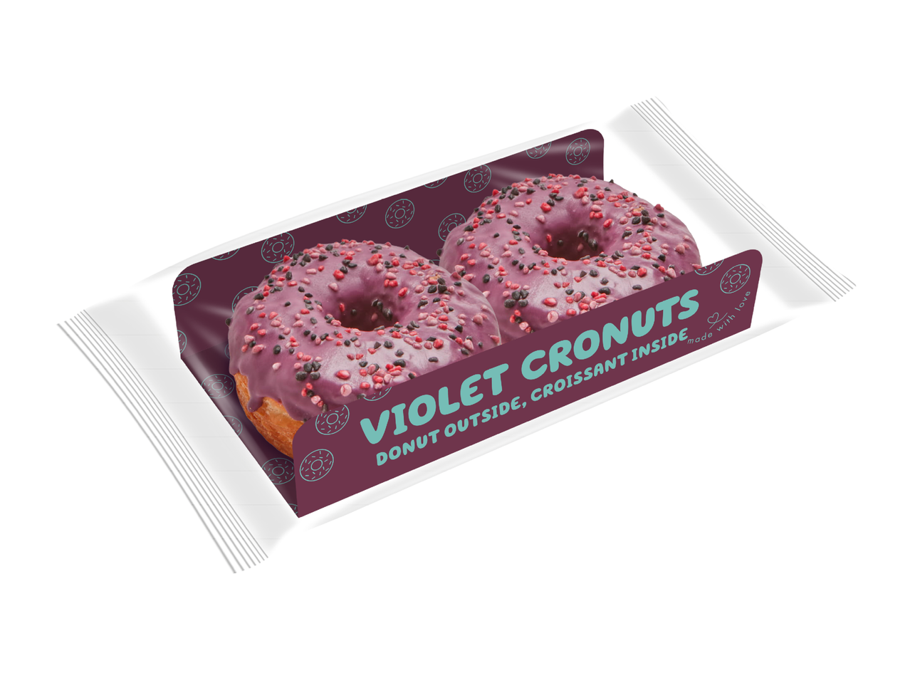 Два лилави кронъта с поръска в прозрачна опаковка, с надпис „VIOLET CRONUTS DONUT OUTSIDE, CROISSANT INSIDE“.
