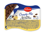 Yoghurt med banan og chokoladeovertrukne cornflakes, med Rainforest Alliance-certificering.