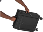 A person lifts a black TopMove suitcase.