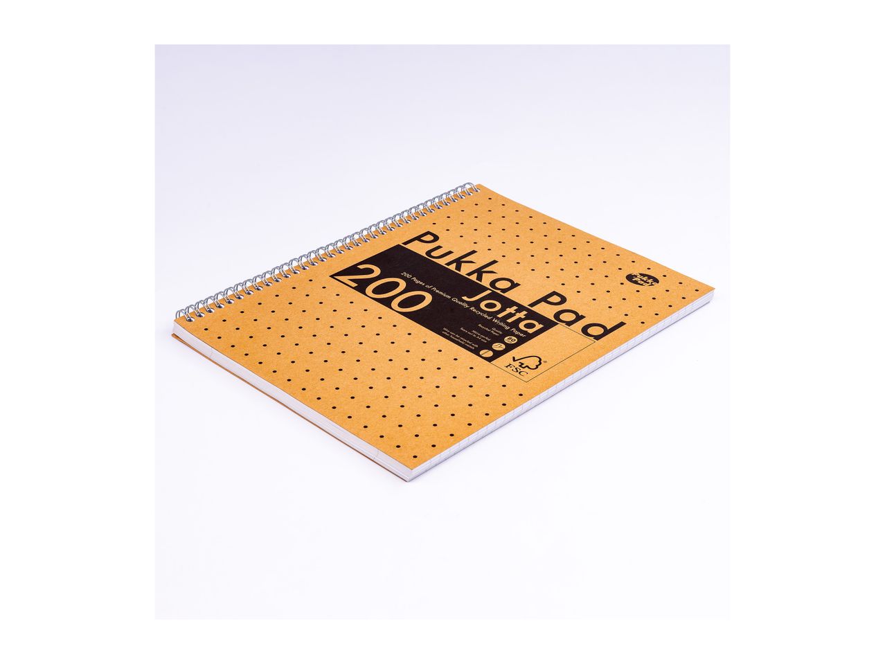 A spiral-bound notebook with a brown cover and black polka dots, featuring text about 200 pages of recycled writing paper.
