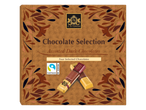 Boîte de chocolats noirs J.D. Gross avec quatre chocolats individuels, dont café-crème et amande.