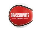 White and red sports ball with the text 'GRASSROOTS SPORTS' on it.
