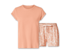 Pfirsichfarbenes T-Shirt und Shorts mit tropischem Muster