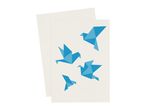 Four origami birds on a beige card, with a second sheet of paper layered behind.