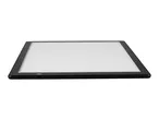 A black light pad with a white illuminated surface and rulers on the edges.