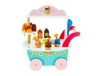 Wooden toy ice cream cart with various ice cream cones, popsicles, and sauces.