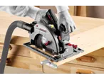 PARKSIDE PERFORMANCE PPHKSA 40-LI cordless circular saw cutting wood, with safety gloves.