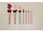 Conjunto de pincéis de maquilhagem Cien Beauty com vários pós e texturas.
