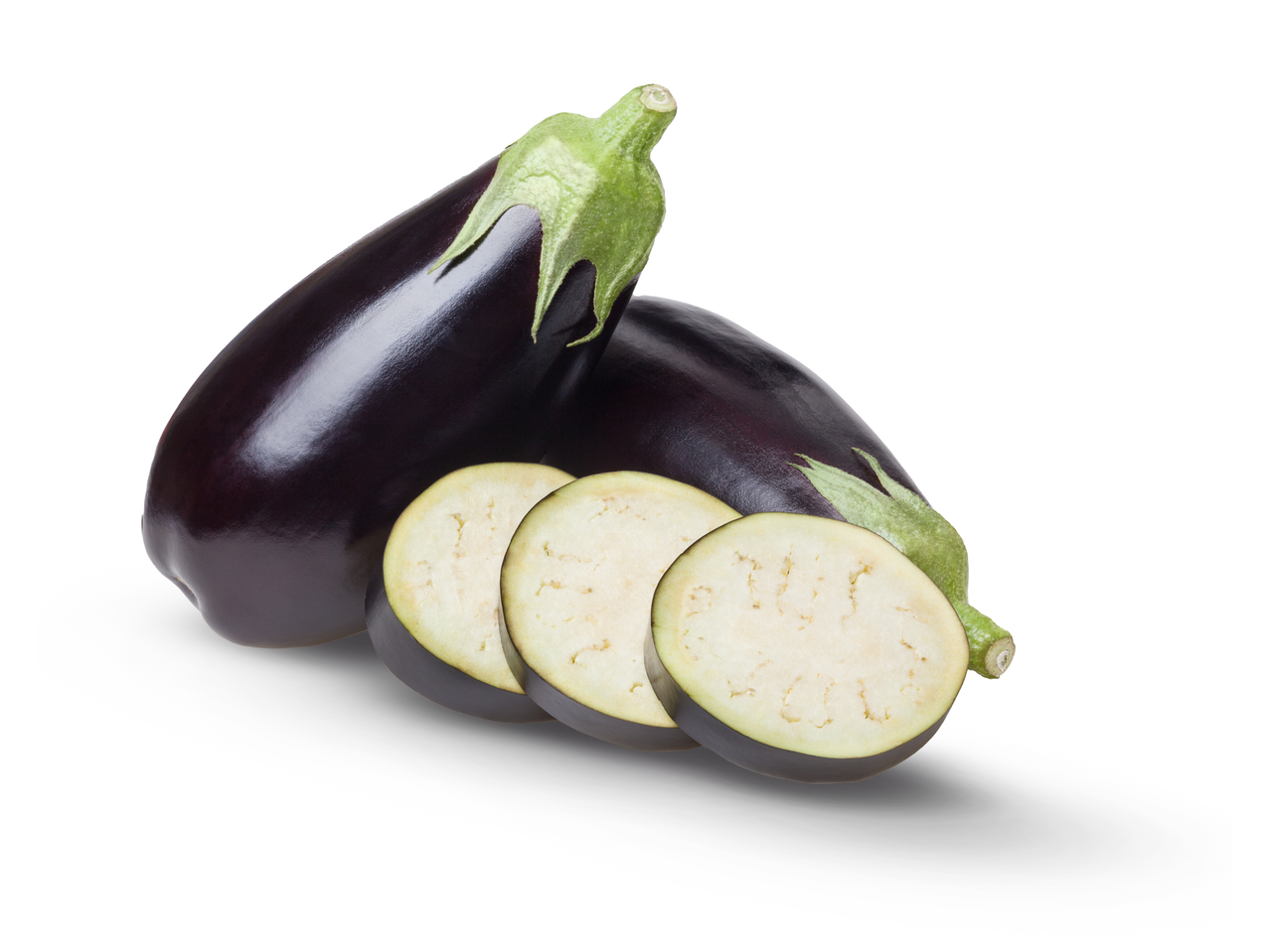 Whole and sliced eggplants.