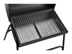 Open black charcoal barbecue grill with two cooking grates and perforated trays.