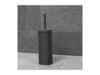 Dark grey toilet brush with a woven texture holder on a tiled bathroom floor.
