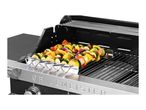 Gas grill with vegetable and meat skewers on a kebab rack, featuring a stainless steel control panel.