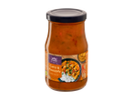 Vitasia Curry & Ananas Woksaus in een glazen pot, met een etiket dat een gerecht met rijst toont.