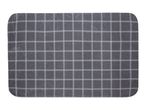 A dark gray grid patterned placemat.