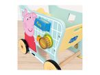 Peppa Pig themed wooden shopping trolley with play food items like pasta and honey.